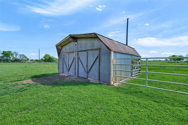 View of outdoor structure featuring fence and an outdoor structure | Image 39
