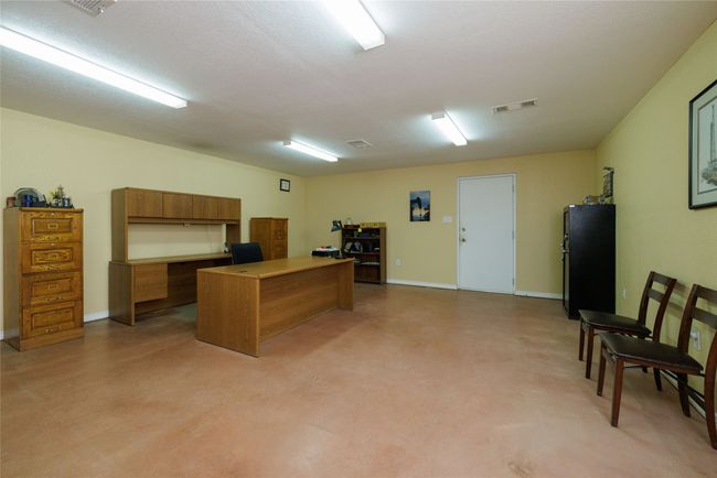 Office area with baseboards and visible vents | Image 7