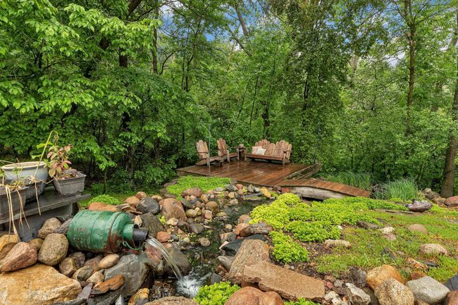 Sit back and listen to the running water of the fountain surrounded by beauty | Image 49