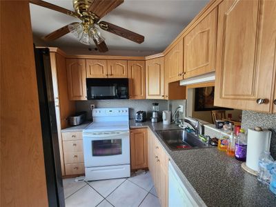 414 - 4806 Nw 36th St, Condo with 2 bedrooms, 2 bathrooms and null parking in Lauderdale Lakes FL | Image 1