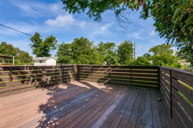 View of large wooden deck. | Image 18