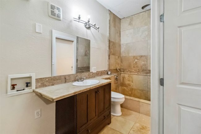Full bath with vanity, a shower and tile patterned floors | Image 14