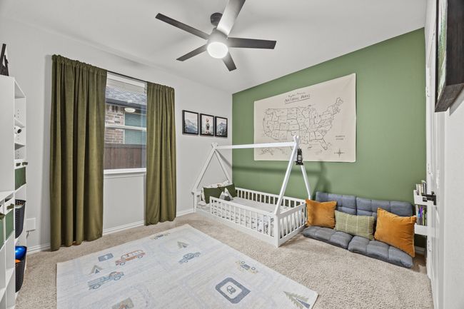 Carpeted bedroom with ceiling fan | Image 14