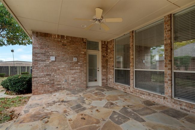 View of patio with a ceiling fan | Image 33