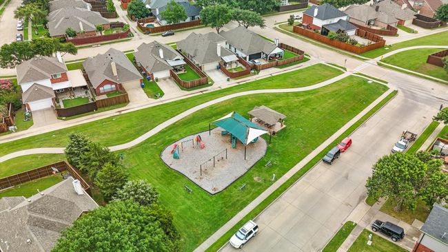 Home backs up to small park | Image 37