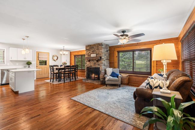 You'll enjoy an open floorplan with the living room open to the kitchen and dining area. | Image 8