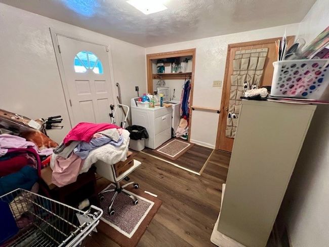 Main floor laundry room separating two units | Image 8