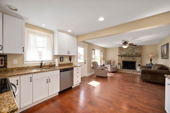 Fully updated kitchen with new cabinets, granite countertops, stainless appliances, and hardwoods. | Image 27