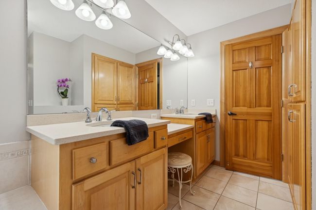 Upper Level Primary Bathroom Double Bowl Vanity and Large Linen Closet | Image 27