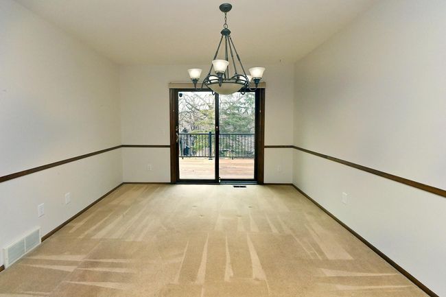 Freshly Painted Main Floor Dining room off Kitchen Features Sliders out to Large Deck! | Image 17