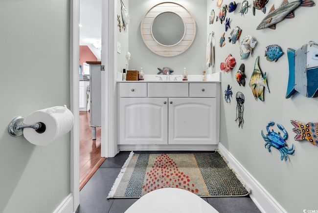 Corridor with hardwood / wood-style flooring and ornamental molding | Image 8