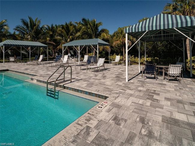 View of swimming pool with a gazebo and a patio | Image 28