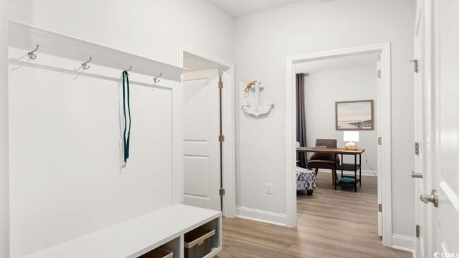 Mudroom with baseboards and light wood finished floors | Image 30