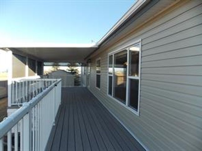 77 - 5210 65 Ave, Home with 3 bedrooms, 2 bathrooms and 3 parking in Olds AB | Image 42