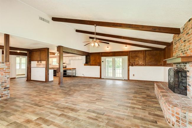 View of Living Area toward Kitchen. Huge Living Area is approximately 29'3" x 20'1". Buyer to verify all room measurements. | Image 22