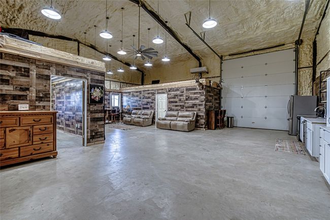 Featuring a 14ft insulated rollup door | Image 36