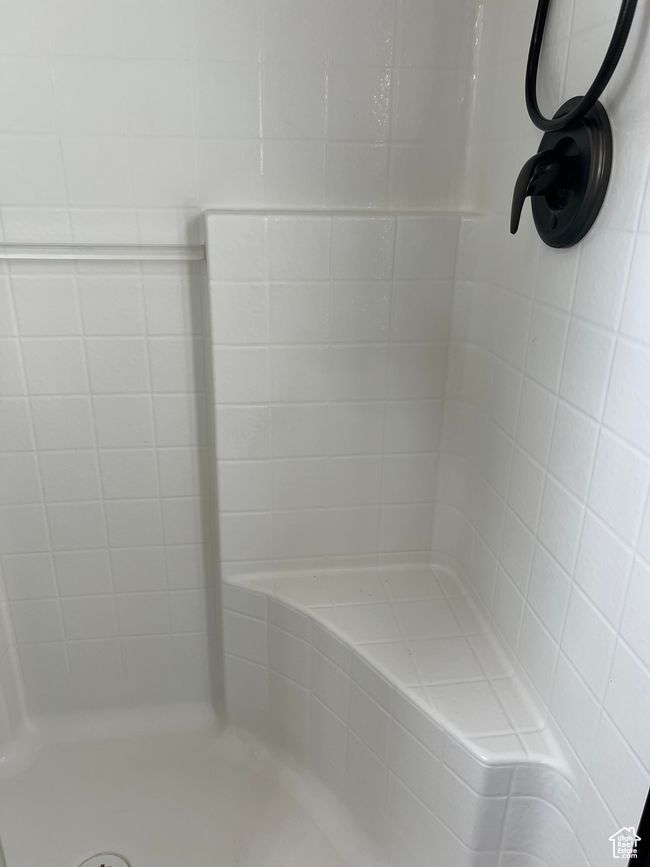 Bathroom with a tile shower | Image 62
