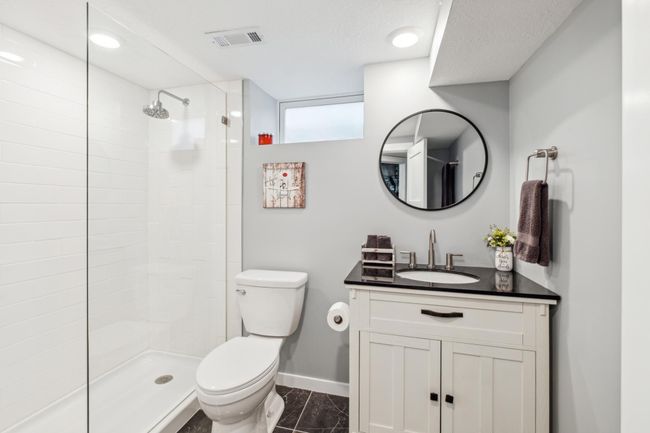 Lower-level bath with ceramic floors & shower | Image 15