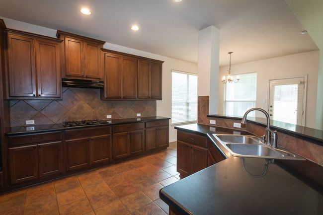 7617 Covered Bridge Dr, House other with 5 bedrooms, 4 bathrooms and 2 parking in Austin TX | Image 9