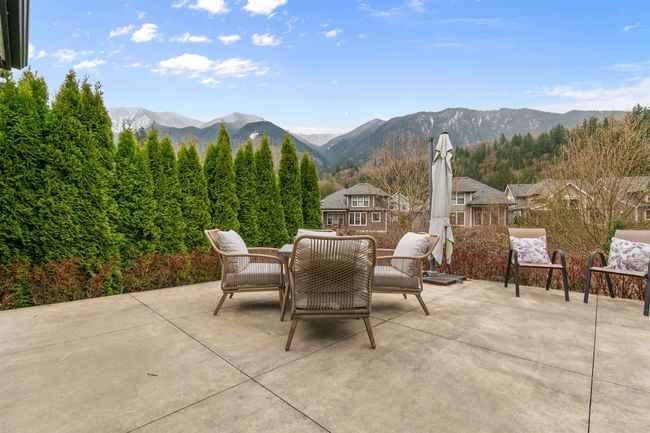 View of patio with an outdoor living space and a mountain view | Image 25