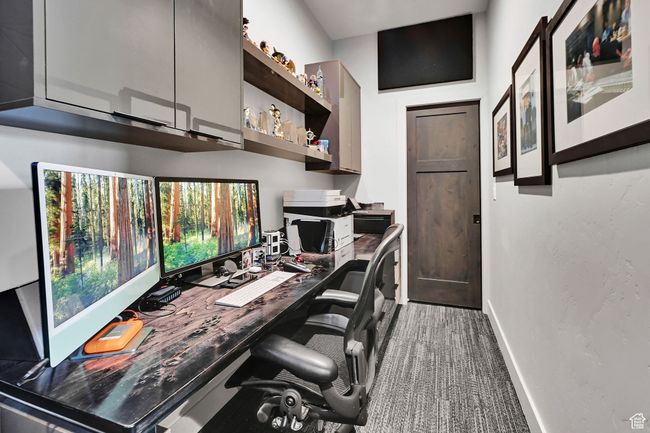 Carpeted home office with baseboards | Image 45