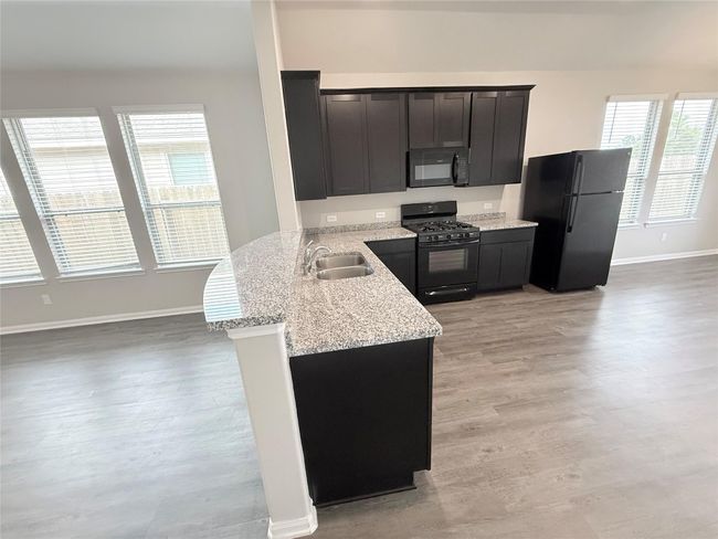 14501 SUGAR PINES DR - Living room and Kitchen | Image 12