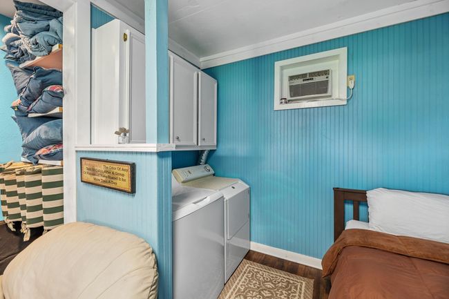 Laundry area downstairs | Image 8