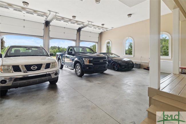 An over-sized three car garage finishes off this well designed home. | Image 40