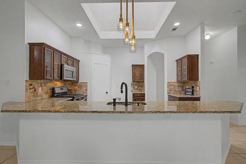 1104 Angel Fire Ln, Arlington, TX, 76001-7897 | Card Image