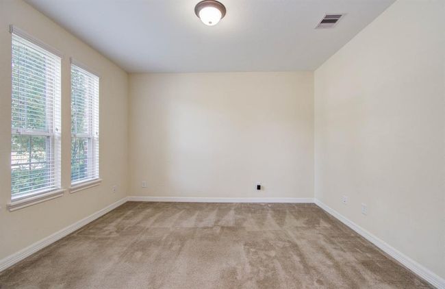 Study with French doors off front foyer can also be used as a formal dining room. | Image 5