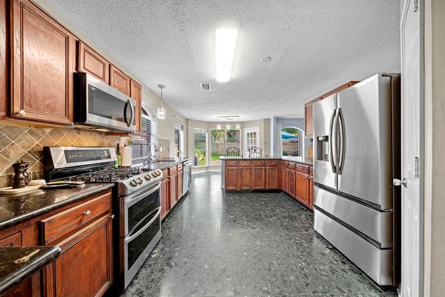 1802 Moston Dr, House other with 6 bedrooms, 4 bathrooms and 2 parking in Spring TX | Image 6