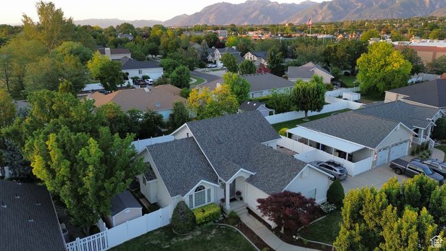Aerial perspective of suburban area featuring a mountainous background | Image 26