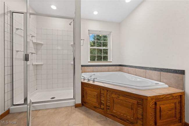 Bathroom featuring tile patterned flooring and separate shower and tub | Image 20