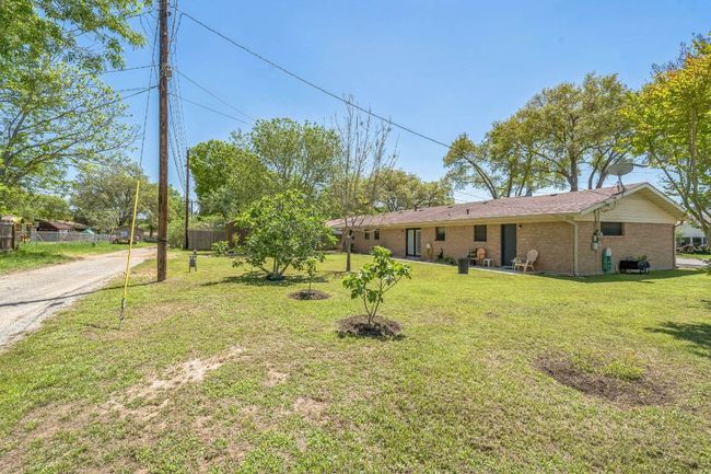 View of yard with fence | Image 4