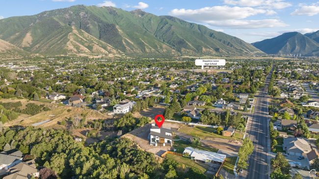 View of property location with mountains and nearby suburban area | Image 98