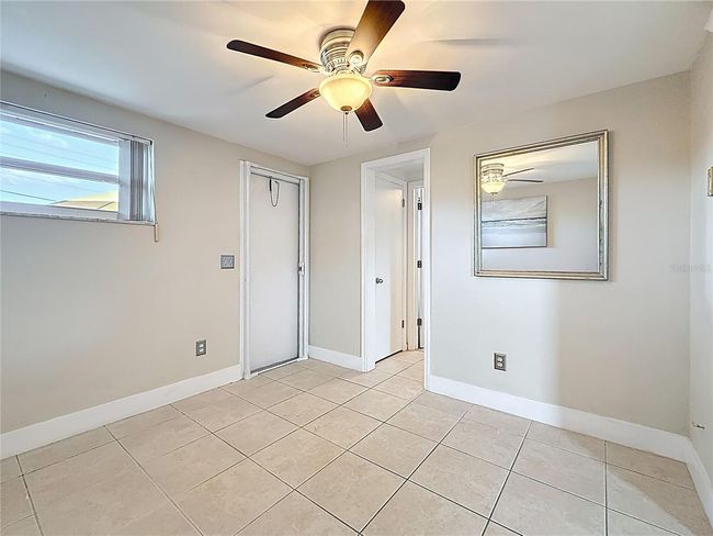 Bedroom 2 - Door To Rear Patio and Large Fenced Yard - Access to Full Bath | Image 17