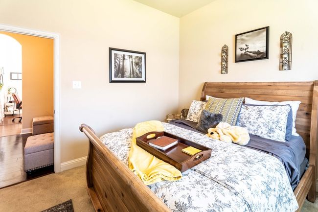 Bedroom featuring baseboards and carpet floors | Image 15