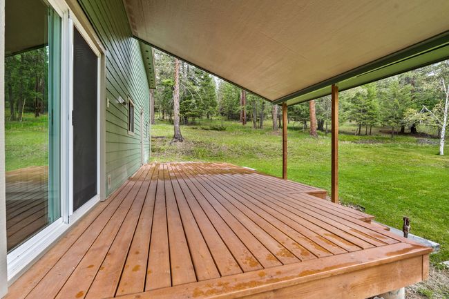 Partially covered back deck | Image 30