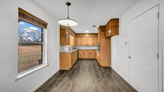 Dining area looking towards kitchen | Image 13