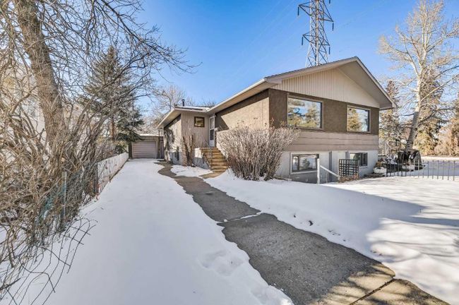 303 38 Street Sw, Home with 3 bedrooms, 2 bathrooms and 3 parking in Calgary AB | Image 1