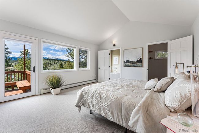 Primary Bedroom with Walk out to the Deck | Image 16