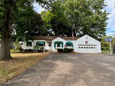 Single story home featuring a garage | Image 3