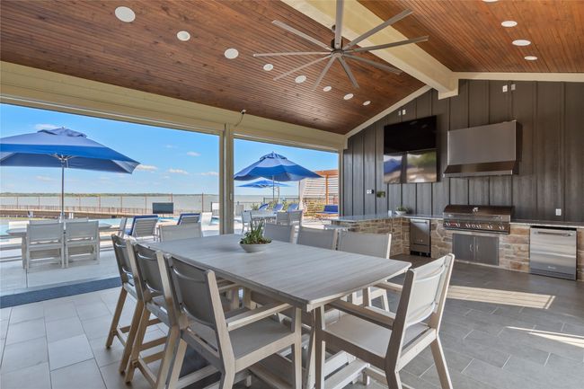 Community open air kitchen and dining | Image 32