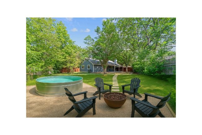 Backyard virtually staged/revisioned with a cowboy pool and fire pit | Image 24
