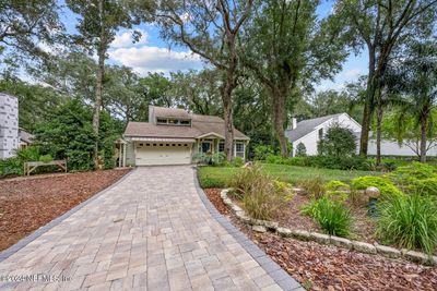 Plenty of guest parking with this paved driveway! | Image 1