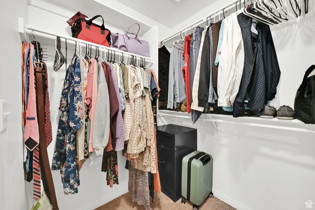 Walk in closet featuring carpet | Image 20