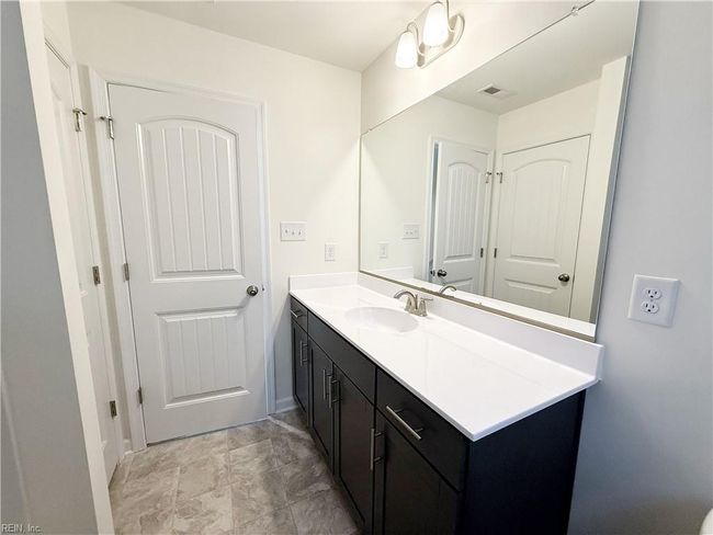 Loft overlooking the family room and a full hall bath complete the second floor. | Image 18