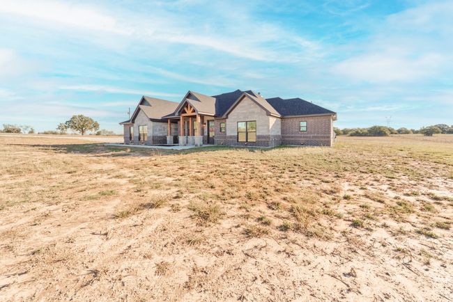 View of front of house featuring stone siding | Image 35