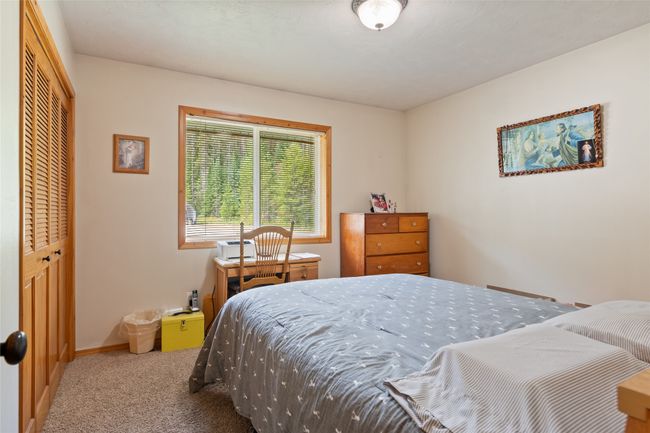 Bedroom featuring carpet flooring and a closet | Image 34