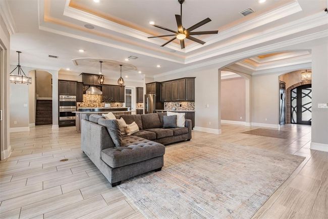 Warm and inviting family room | Image 17